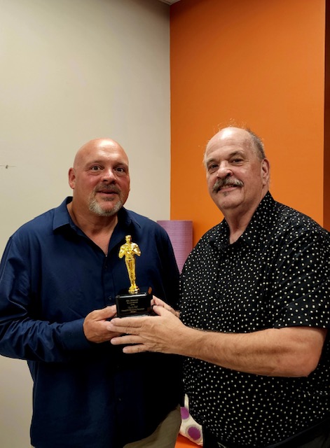 TeamPPOS's tweet photo. Executive Director of @PAIFPA, Chris Sloan, and our VP of Branding &amp; Creative Services, Joe Knezic, celebrate 3 national 2022 Service Industry Advertising Awards, including a Best of Show, Gold and Bronze. Check out the award-winning video, "Clumsy Con": https://t.co/pvYXCJ2lFo https://t.co/5eB7FFlHXp