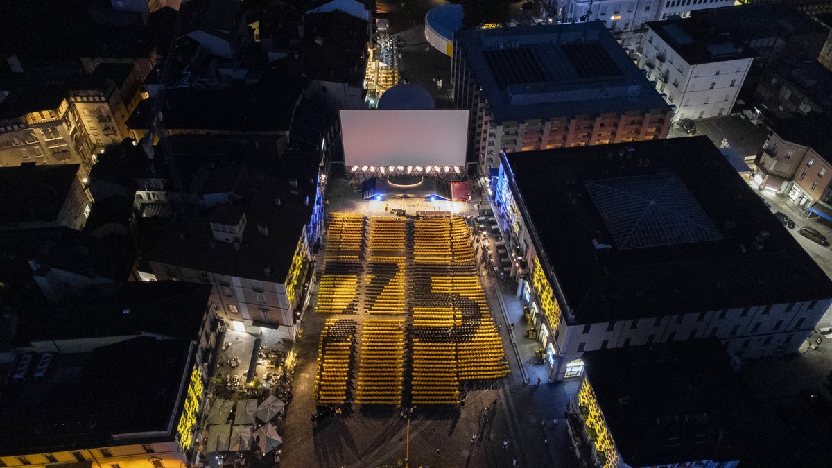 FilmFestLocarno's tweet photo. And so it begins! Celebrating 75 years is a big deal and we are very excited to be welcoming you all again! To celebrate, our #PiazzaGrande chairs have been placed accordingly, we can't wait to see them all filled tonight for #BulletTrain, see you then! https://t.co/VvThADxo2x https://t.co/N4WcJCTf5F