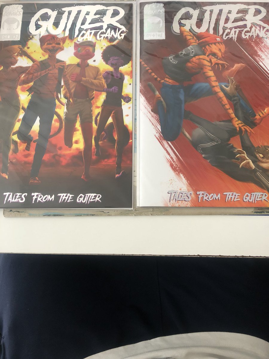swavevince's tweet photo. Got my first holographic gutter comics should I unfold them?
Thanks @GutterCatGang #ganggang #GutterCatGang #guttercomics #talesfromthegutter https://t.co/bGeHNpCiKn