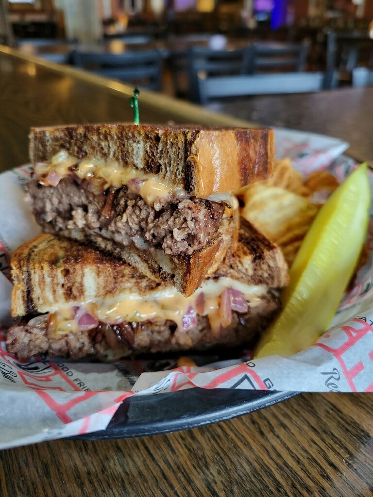 ShotsOnTheRiver's tweet photo. This will definitely melt in your mouth. $8 Patty Melt with grilled onions, Swiss cheese, 1000 island on marble rye.  Lunch time is almost here and you should definitely be here at Shots on the River! #shots #SOTR #shotsontheriver #shotslunchspecial #localeats https://t.co/0q6seFqKHr