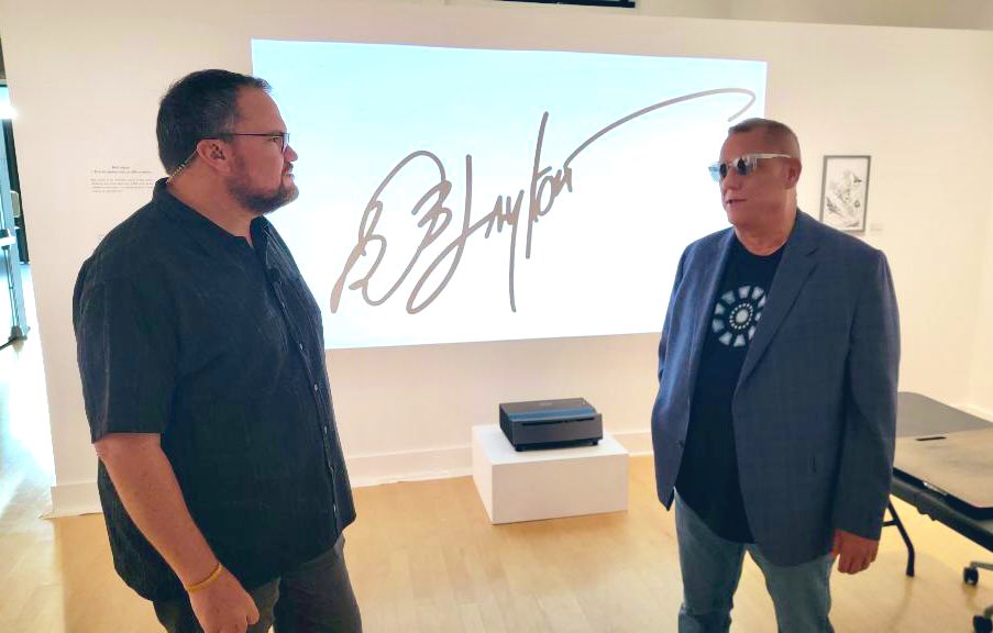 CharleyBelcher's tweet photo. Together again for the very first time! Definitely a thrill to hang with @Bob_Layton this morning. He was nice enough to sign my copy of Demon in a Bottle, and even drew an Iron Man for me. #fanboy #shellhead #grateful #GoodDayTB https://t.co/w194MUN5of