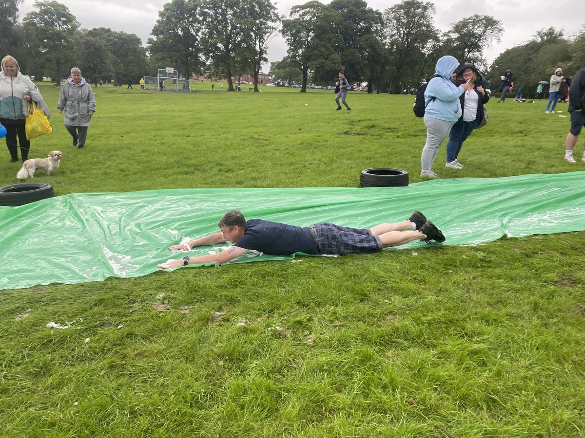 Congratulations to Councillors Graham Barton and Neal Ingram who took part in the Water Slide at the East Ayrshire Annual Play Day ⁦<a href="/EastAyrshire/">East Ayrshire</a>⁩ ⁦@EALeisure⁩ . A great event and the real weans enjoyed it.