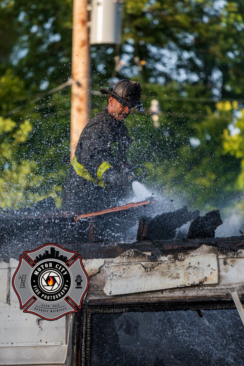 LT Mitchell of E30 detailed to Squad 5 washes down after a fully involved vacant dwelling fire. Revere &amp; Lantz 7/28/22