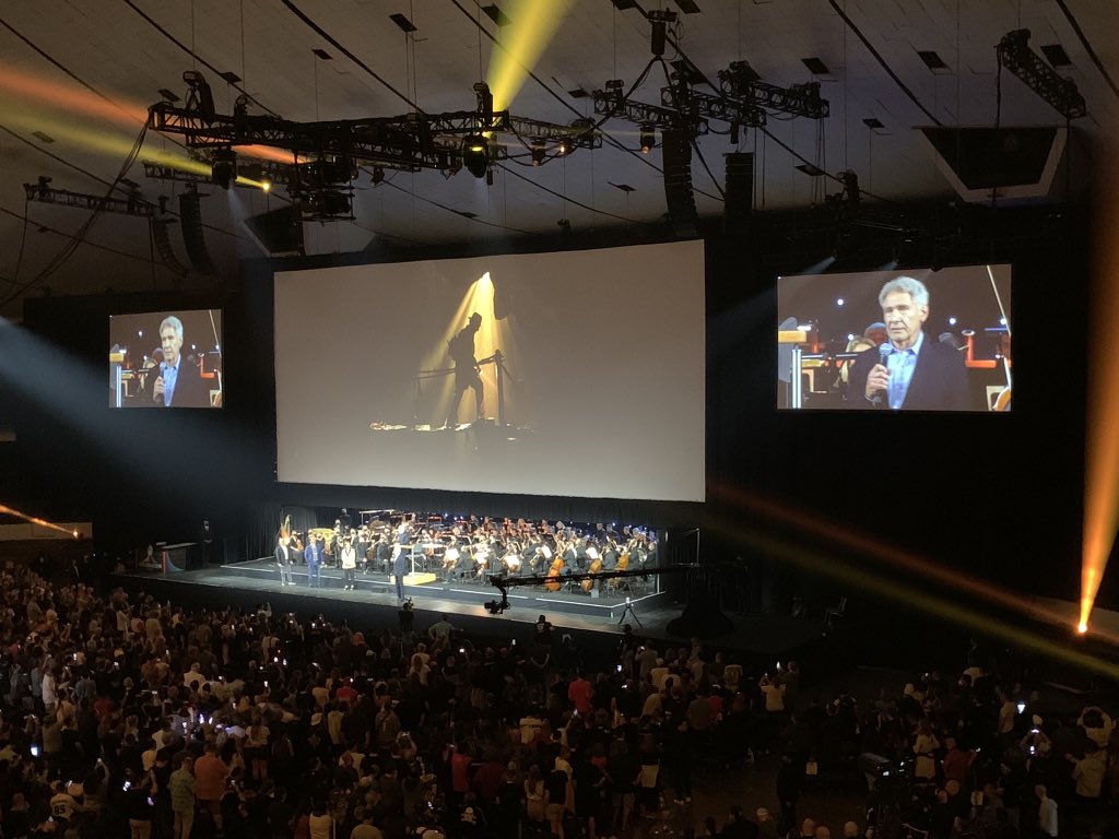 Harrison Ford wishing John Williams a happy birthday together on stage  