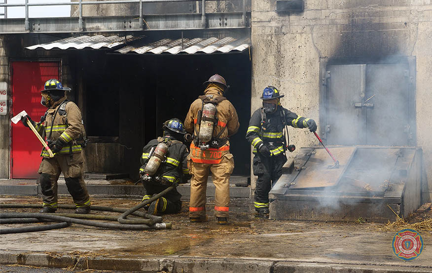 MassDFS's tweet photo. Recruits from #Class303 are preparing to make entry into a basement for fire suppression as part of their training at the Massachusetts Firefighting Academy. This photo was taken at the Burn Building in Stow -- the site of many fond memories in the Massachusetts fire service. https://t.co/wV3IQqy5Ea