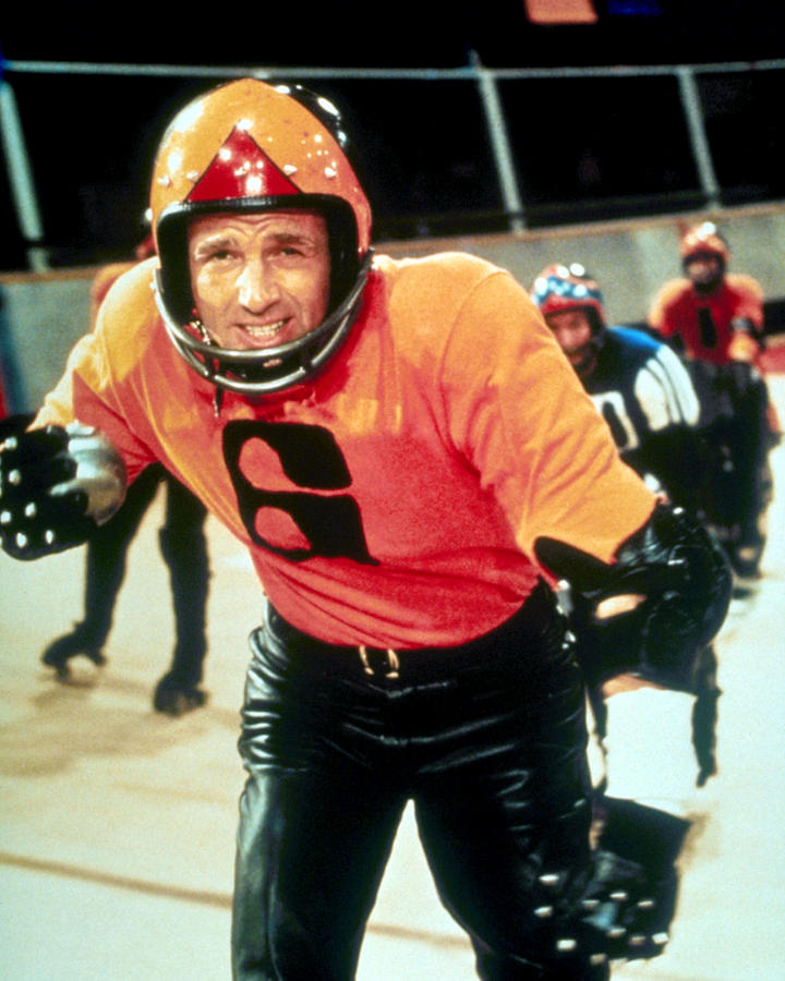 35mm Print! In memory of the late #JamesCaan we're proud to present Norman Jewison's ROLLERBALL, one of the best films of the 1970s! See it Friday, August 5 at Midnight at Landmark's #NuartTheatre! spr.ly/6014z46P6