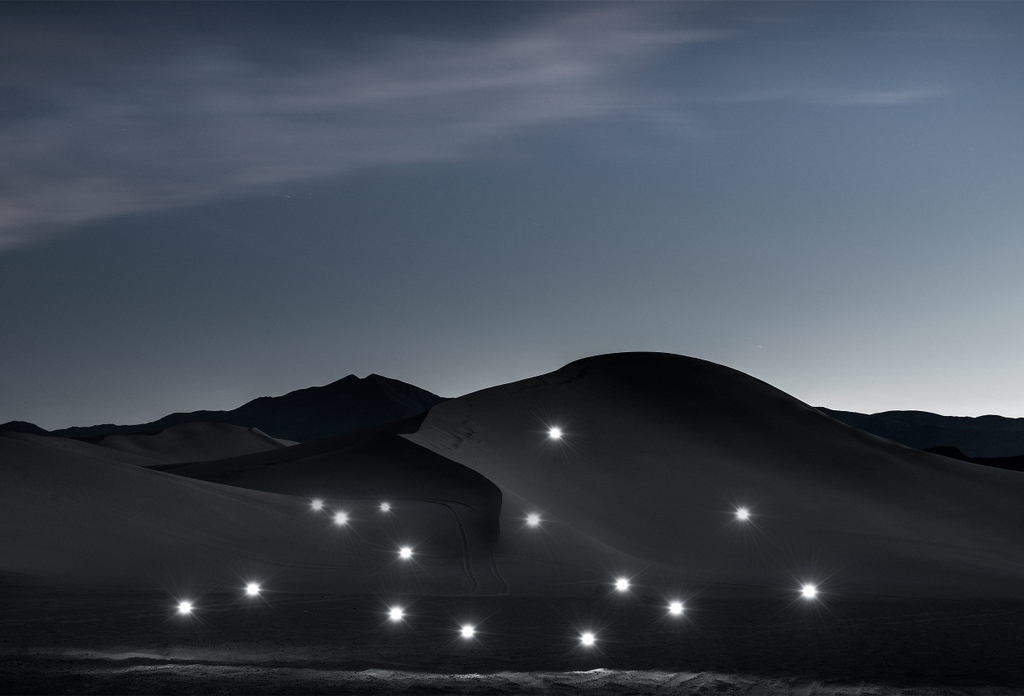Mysterious #desert lights in a photo by 
<a href="/K_GRUNERT/">kristophergrunert.eth</a>

Some photos from this project have sold as #NFTs for as much as 5 ETH. His work has been in galleries from  Osaka to NYC to Paris.⁠
⁠
More at tppp.photo/photographers/…

#drone #landscape #cinematic
#personalproject