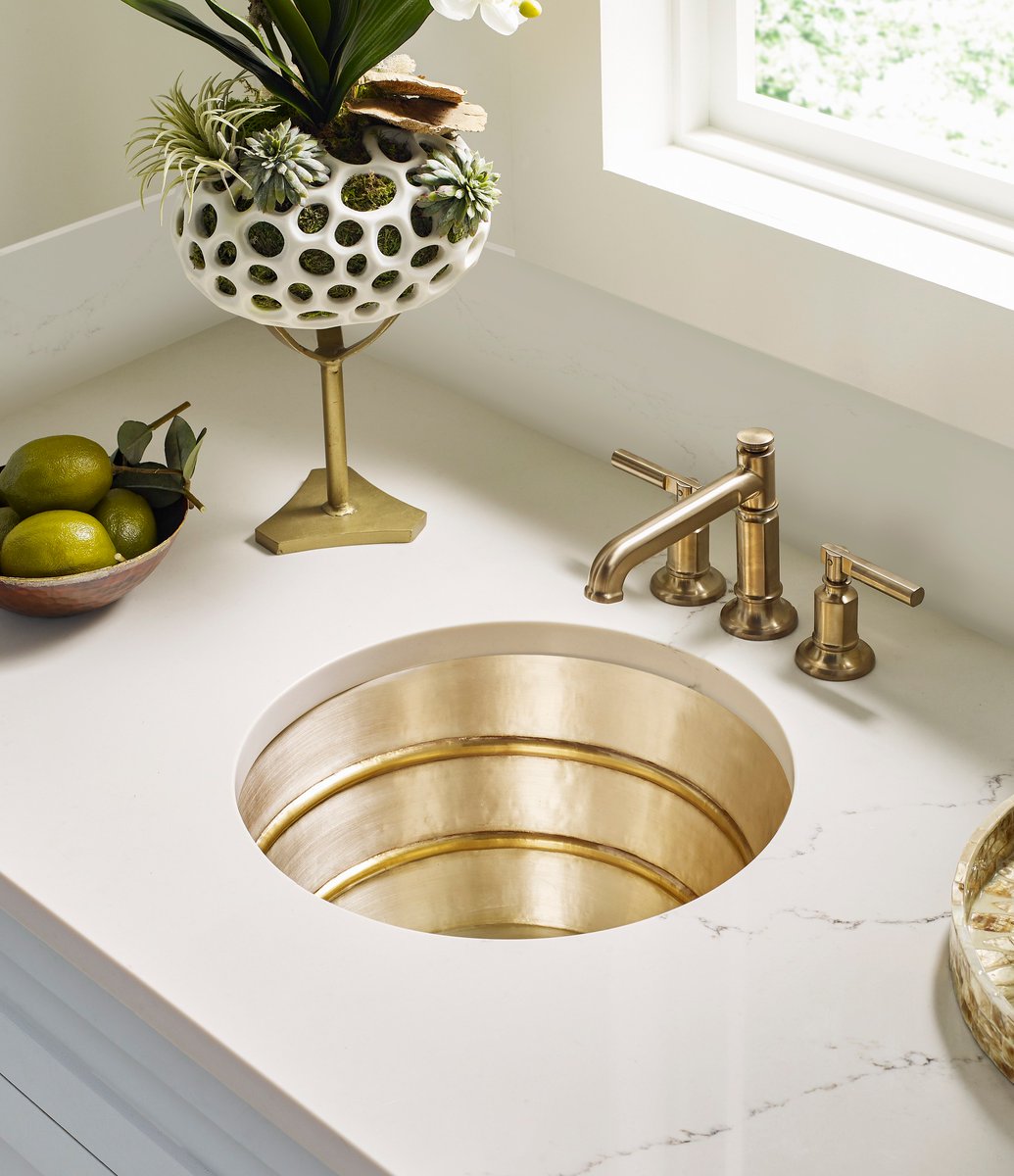 Our luxurious Quintana Collection Bar Sink unites our founder's refined vision of hand-crafted creations with the modern, tailored aesthetic of interior designer Kara Cox Interiors. Learn more and see the full collection: thompsontraders.com/kara-cox/ #ThompsonTraders #BarSink #WetBar