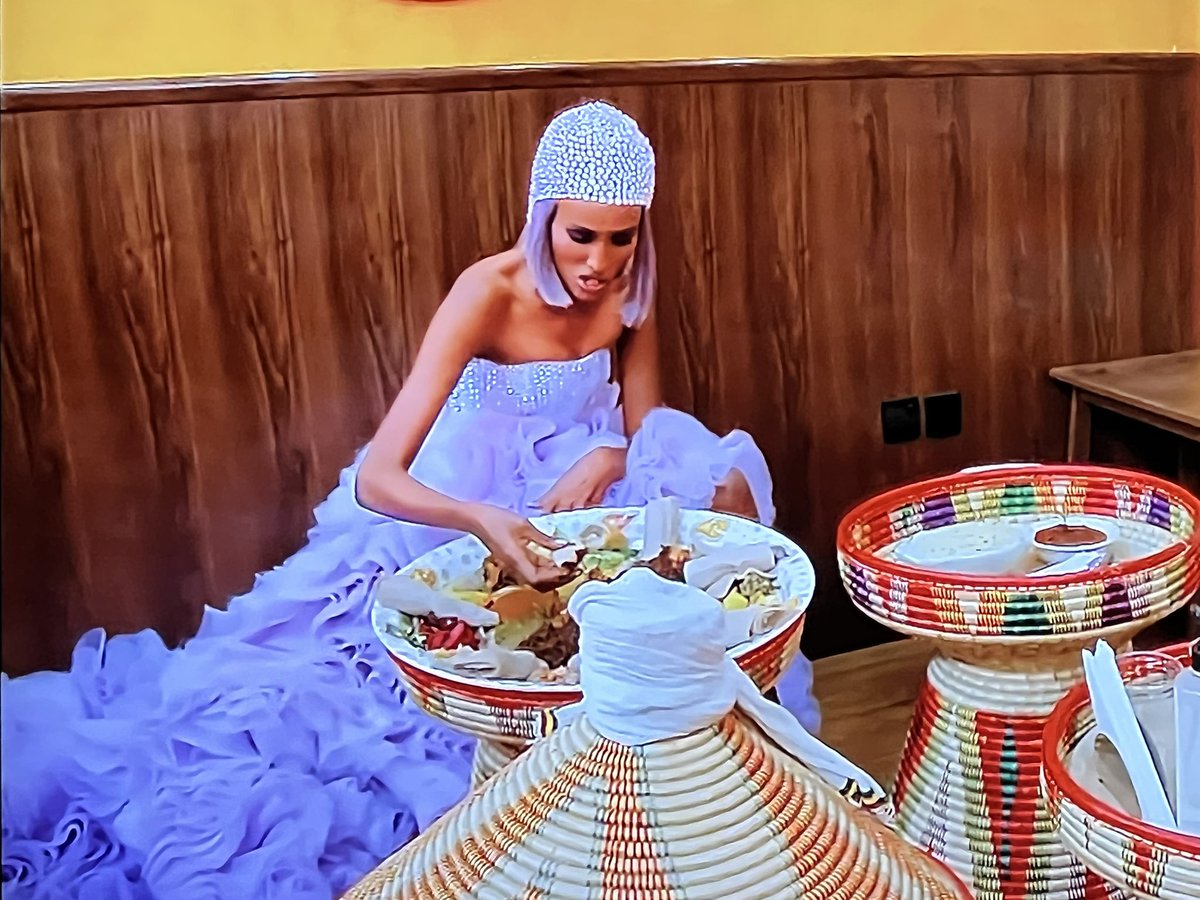 BravoAndBlaze's tweet photo. Chanel wearing couture eating Ethiopian food alone is a whole mood 🤣 #RHODubai https://t.co/sUiAZpy04G