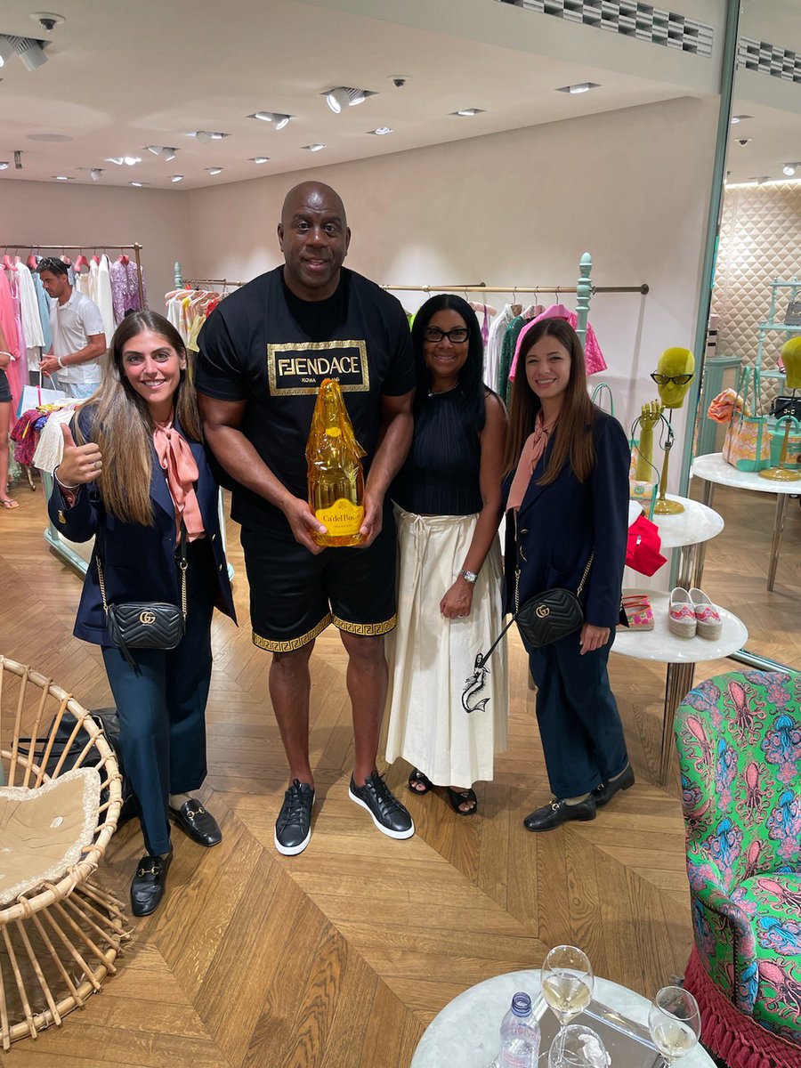 MagicJohnson's tweet image. Our friends at Gucci in Capri, Italy surprised us with a beautiful gift, a champagne bottle with our names carved in the side!
