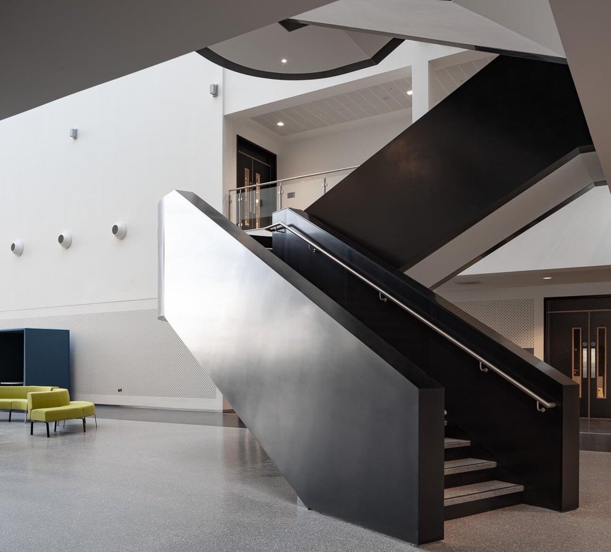 Further detail images of our solid surface project in a major pharmaceutical facility in Ireland.

The project involved solid surface cladding to external balustrade, internal balustrade with metal handrail detail, top capping and partial underside over four storeys.