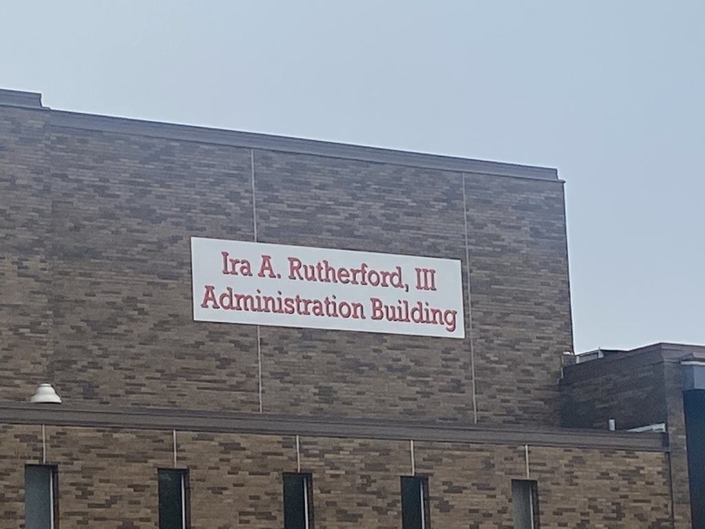 BeecherSchools's tweet photo. The district officially named our administration building the Ira A. Rutherford, III Administration Building.   As Mr. Rutherford addressed the audience during the board meeting, he stated he was grateful and humble. https://t.co/5B5gh1yWF2