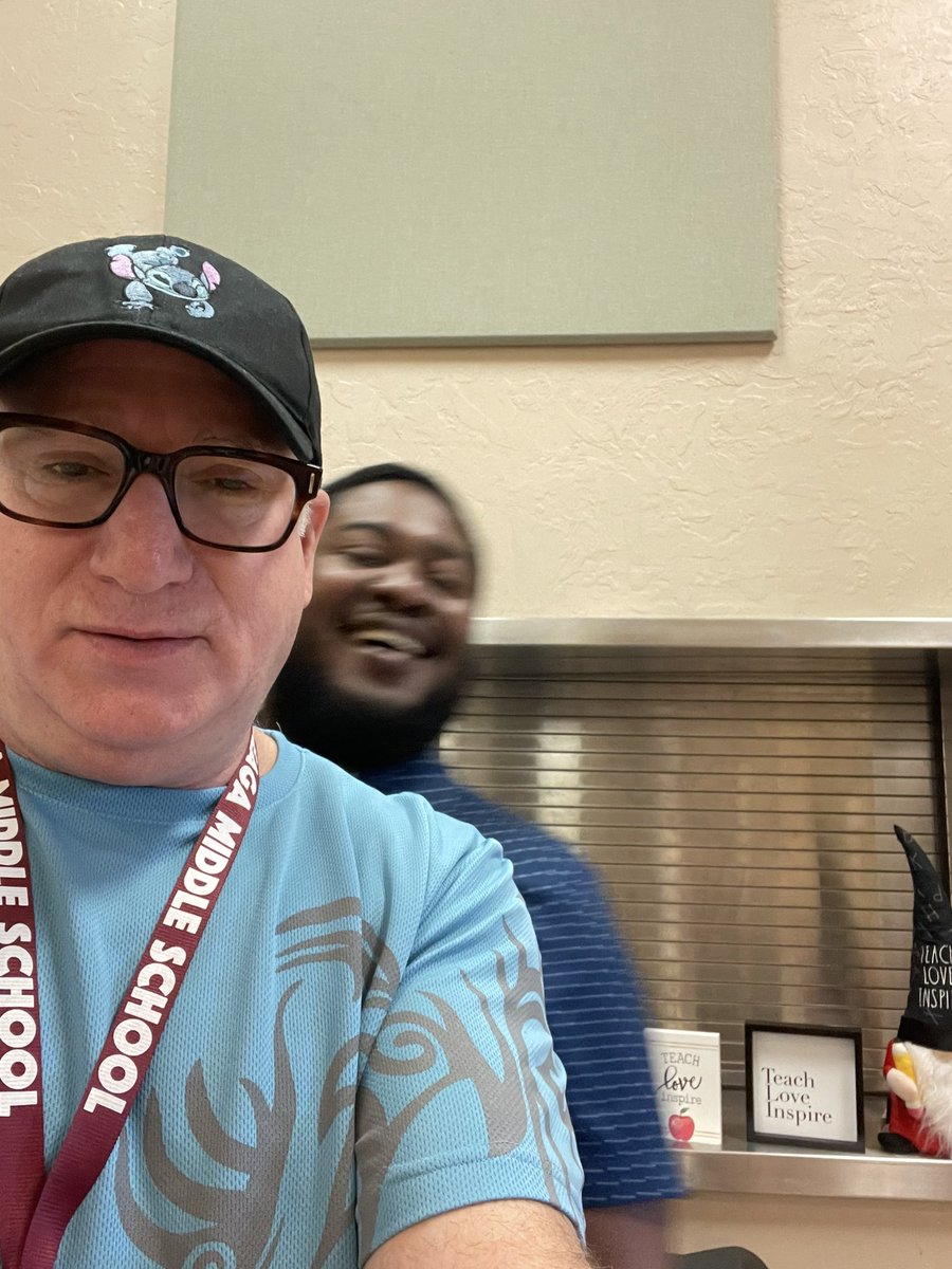 Andrew was being pulled away he is actually taller than me!