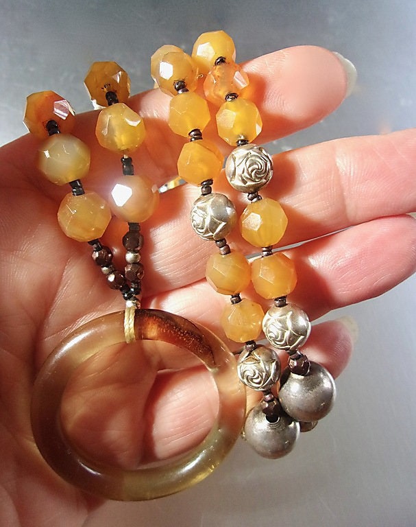 renaissancefai's tweet photo. Orange Quartz Sterling Silver Necklace, Lucite Ring, Sterling Rosettes & Beads, 26 Inch Vintage https://t.co/HGJyFLxkvd #orange #yellow #quartz #women #silver #hook #sterlingnecklace #orangequartz #sterlingrosettes https://t.co/WtNk9R61J1