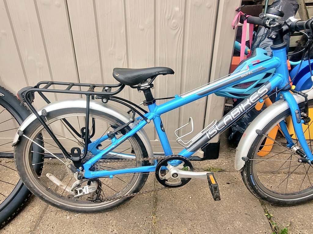 Running2staysa1's tweet photo. Small has his own bike rack! He is so excited, just checking panniers that will fit, think I have found some front panniers that are small enough & can be used on rear rack.#pannierrack #cycling #islabike #cyclingwithkids https://t.co/x1dhZtboxx