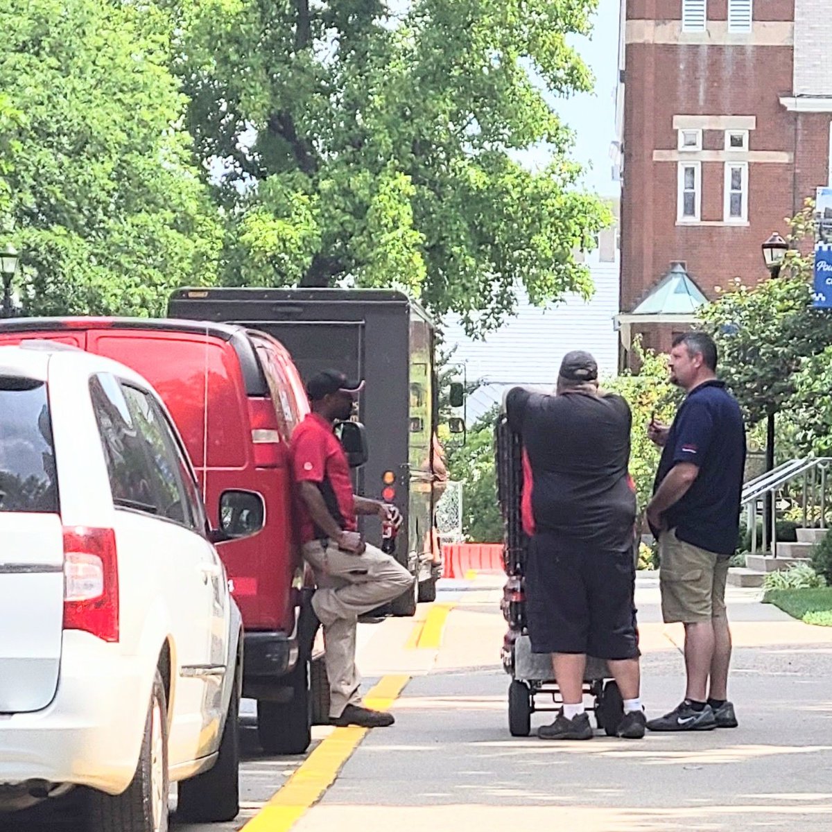 DeKoustav's tweet photo. This in-uniform CocaCola transporter taking a break and sipping on a coke while chatting with friends is the best @CocaCola advertisement irl. https://t.co/3kr0kdEvVd