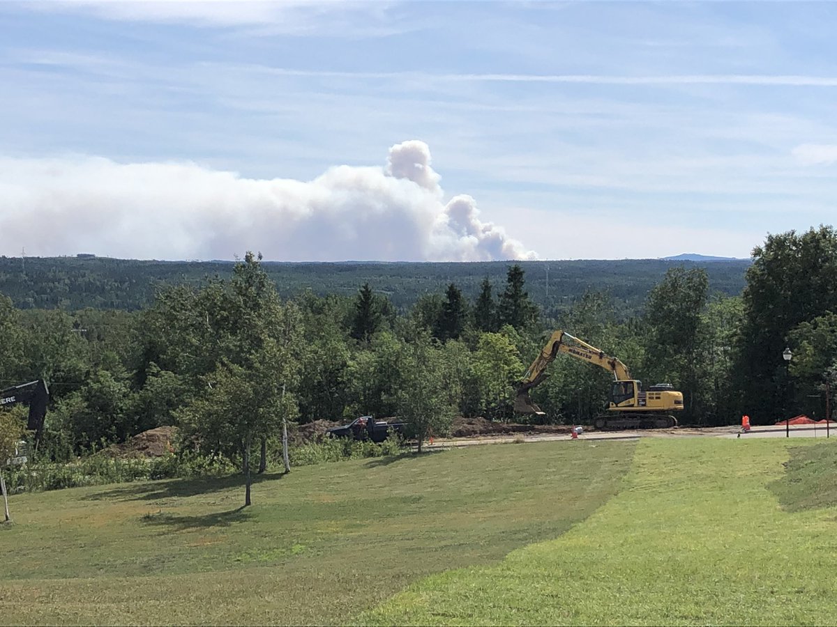 FirechiefVince's tweet photo. The Paradise Lake fires are now very active and highly visible south of @towngfw. The fire is now is extremely active according to @FFA_GovNL. The forestry dept has ordered everyone out. #nltraffic #nlwx   Bay D’Espoir highway is closed to traffic. https://t.co/nLzzDUzC96
