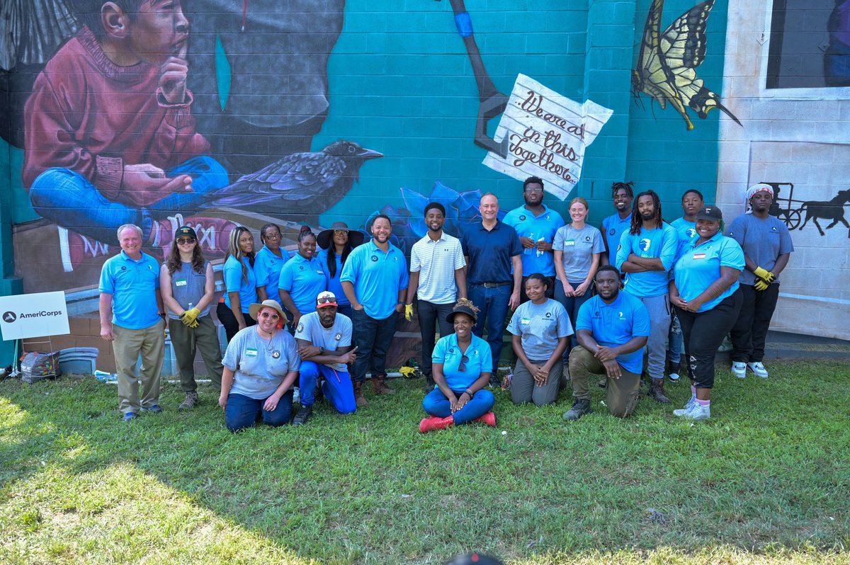MayorBMScott's tweet photo. This is what teamwork looks like! Thank you, @SecondGentleman and @AmeriCorps for coming together to plant our very first rain garden in our Mt. Clare neighborhood! The heat can’t stop us from beautifying our neighborhoods. https://t.co/9VcgPucH1I