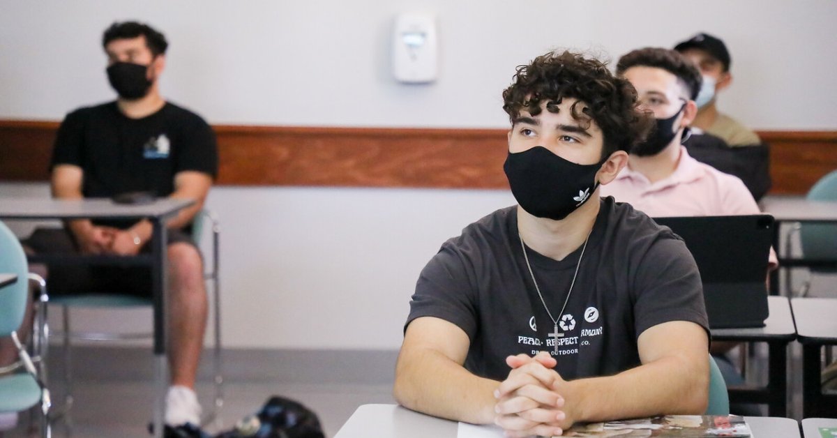 SDSU's tweet photo. In light of recent increased COVID-19 transmission, SDSU is reimplementing its COVID-19 facial covering policy, effective Aug. 15. 

All faculty, staff and students will be required to wear a facial covering in instructional settings regardless of vaccination status. https://t.co/kOWDw3aWn2