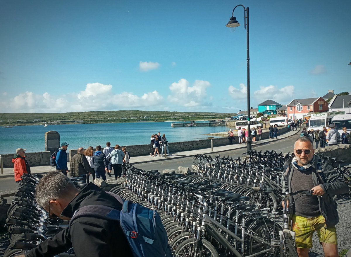 WestToursTales's tweet photo. It was busy at the Kildonan Pier,Inis Mór this morning with @AranFerries arriving from Doolin,Rossaveal &amp; Galway! Cycling is the ideal way to see the Island &amp; we were spoilt for choice @Aran_islands prior to making our way up to #DúnAonghasa Fort @visit_galway https://t.co/2o3F6AliI5