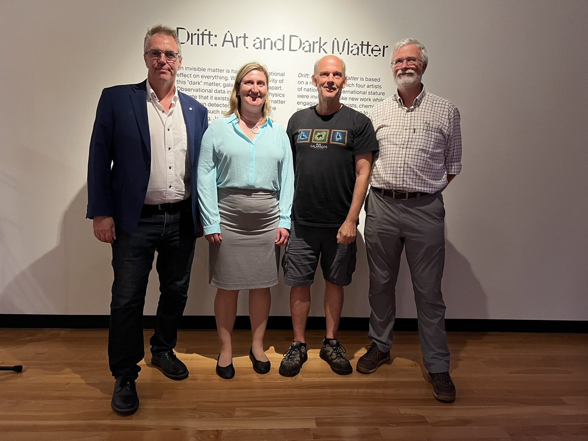 SNOLABscience's tweet photo. Four past and present @SNOLABscience Executive Directors take in the Drift - Art and Dark Matter exhibit. Nigel Smith, Jodi Cooley, Tony Noble and Clarence Virtue. #MacdonaldInstitute #talkscience https://t.co/H4RcTPqEzI