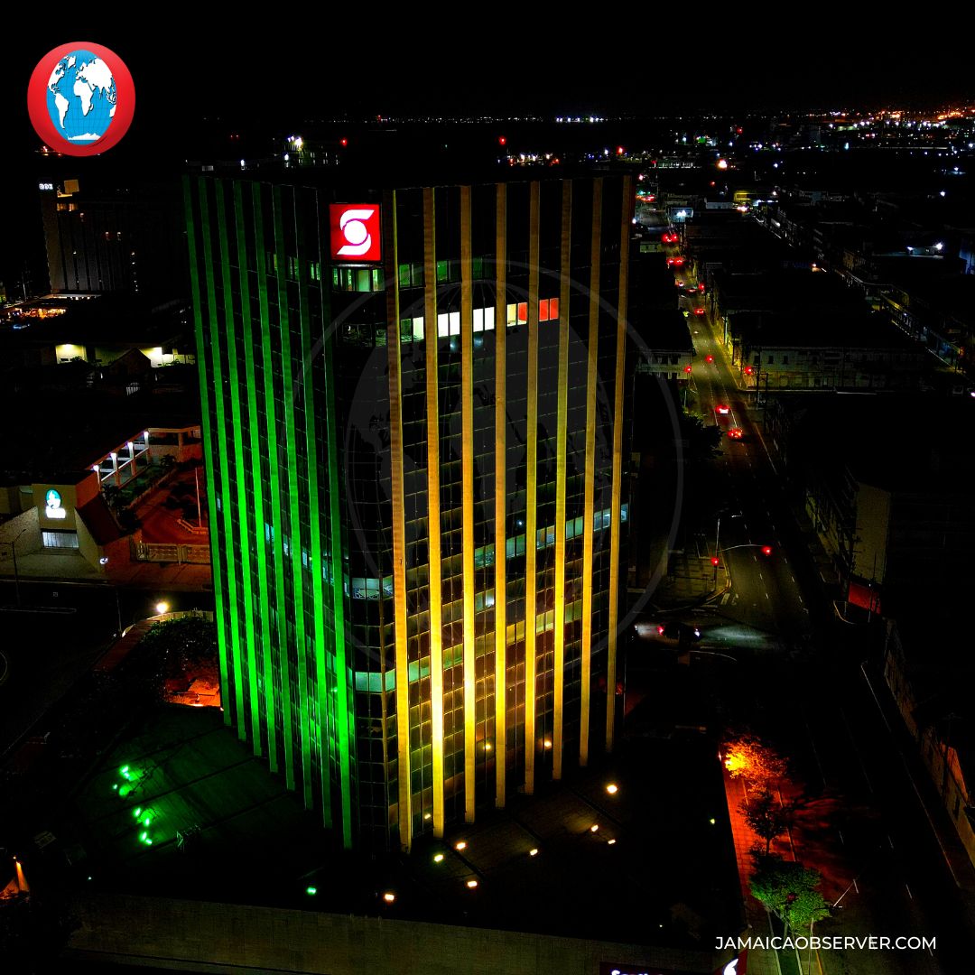 JamaicaObserver's tweet photo. PHOTO: The Scotiabank headquarters located on the corner of Duke &amp; Port Royal Streets on the Kingston Waterfront has been adorned with lights reflecting the colours of Jamaica’s national flag. The effort is in celebration of #Jamaica60 and the bank’s 133rd year of service. https://t.co/MuZKespnAa