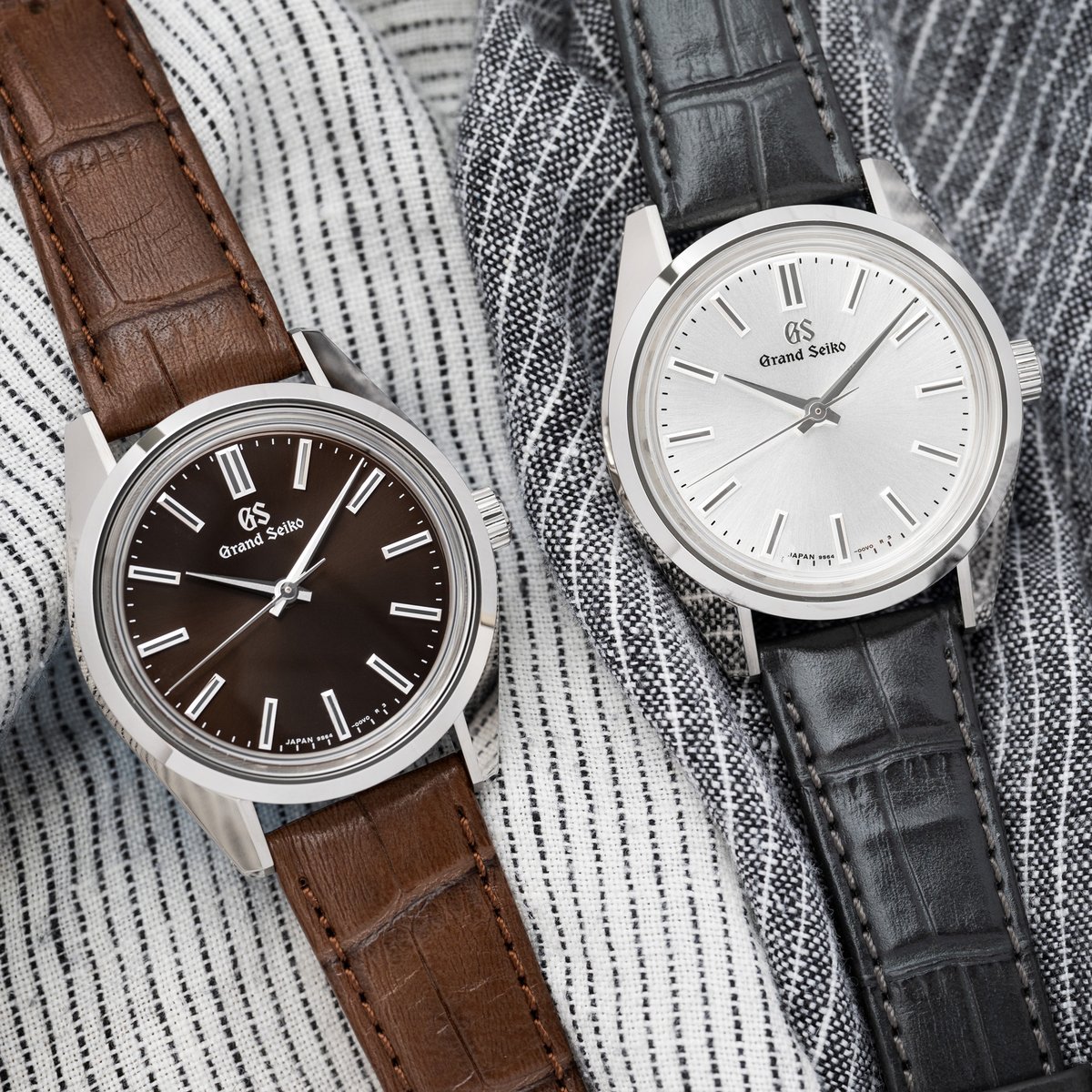 The new #SBGW291 and #SBGW293 are the first continuous production Grand Seiko watches with a mid-sized 36.5mm 44GS case. They feature a silver sunray and brown sunray dial, respectively, each complemented by a matching crocodile strap. Learn more here: bit.ly/3Q7bu2c