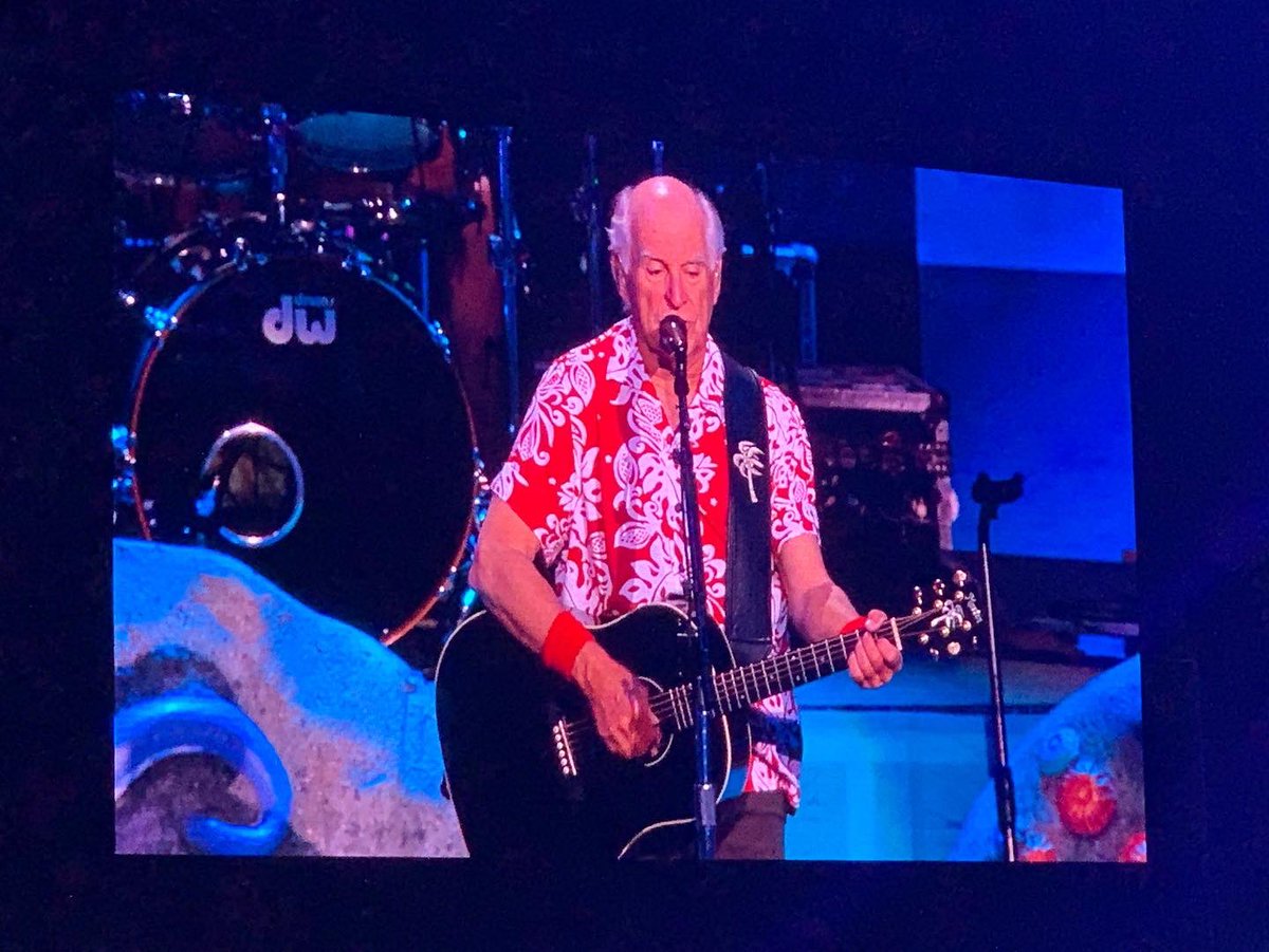 DrJKMitchell's tweet photo. So I finally attended my first Jimmy Buffett and the Coral Reefers Concert and it was held at the same spot as Woodstock in Bethel, New York. It was incredible! #ParrotheadForLife https://t.co/8dzrj4WIbV