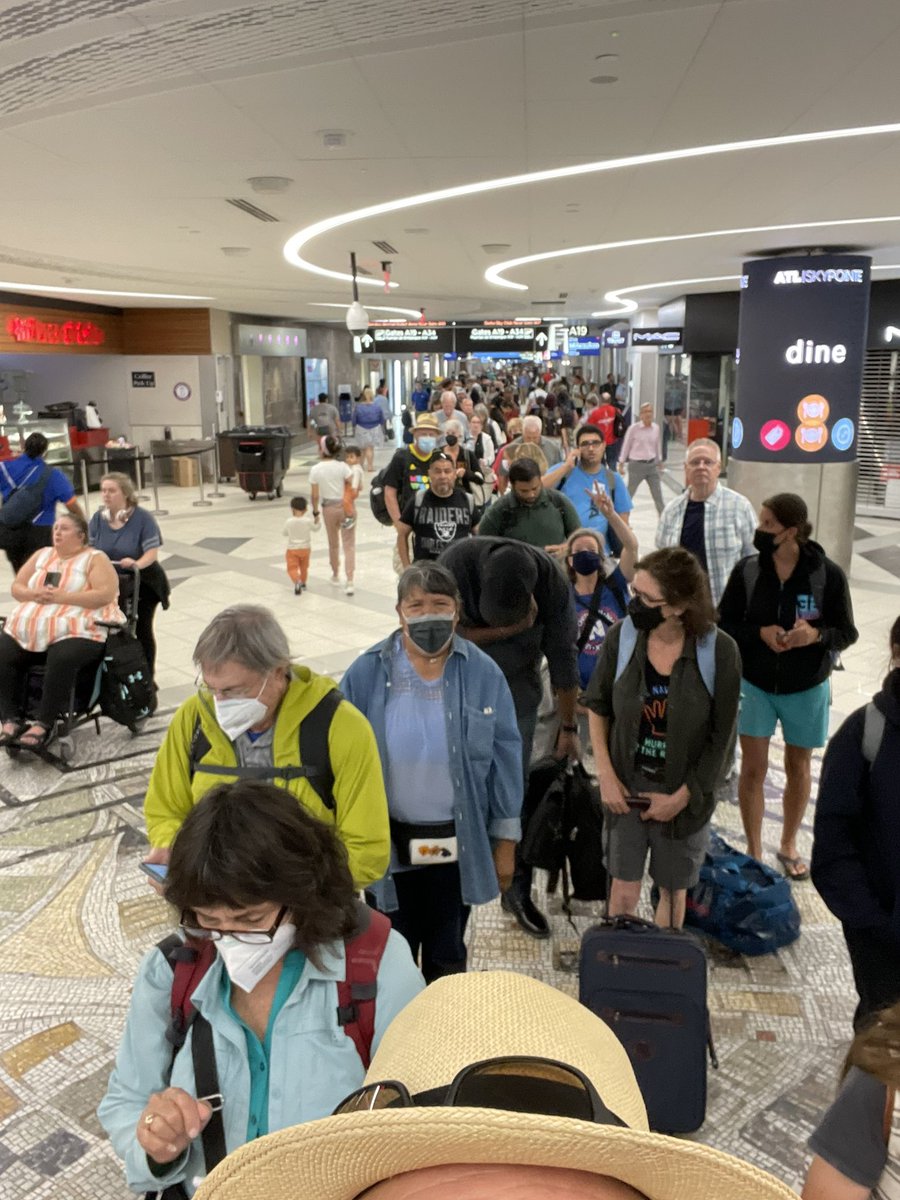 Ardg65's tweet photo. #DeltaAnaconda #GoodMorningAmerica I have been waiting on this line for 2 hours now after being moved from terminal A to terminal B because unlike us passengers, the workers got to go home. There are three employees trying to go through the people in the line. https://t.co/9oaEqxRA9a