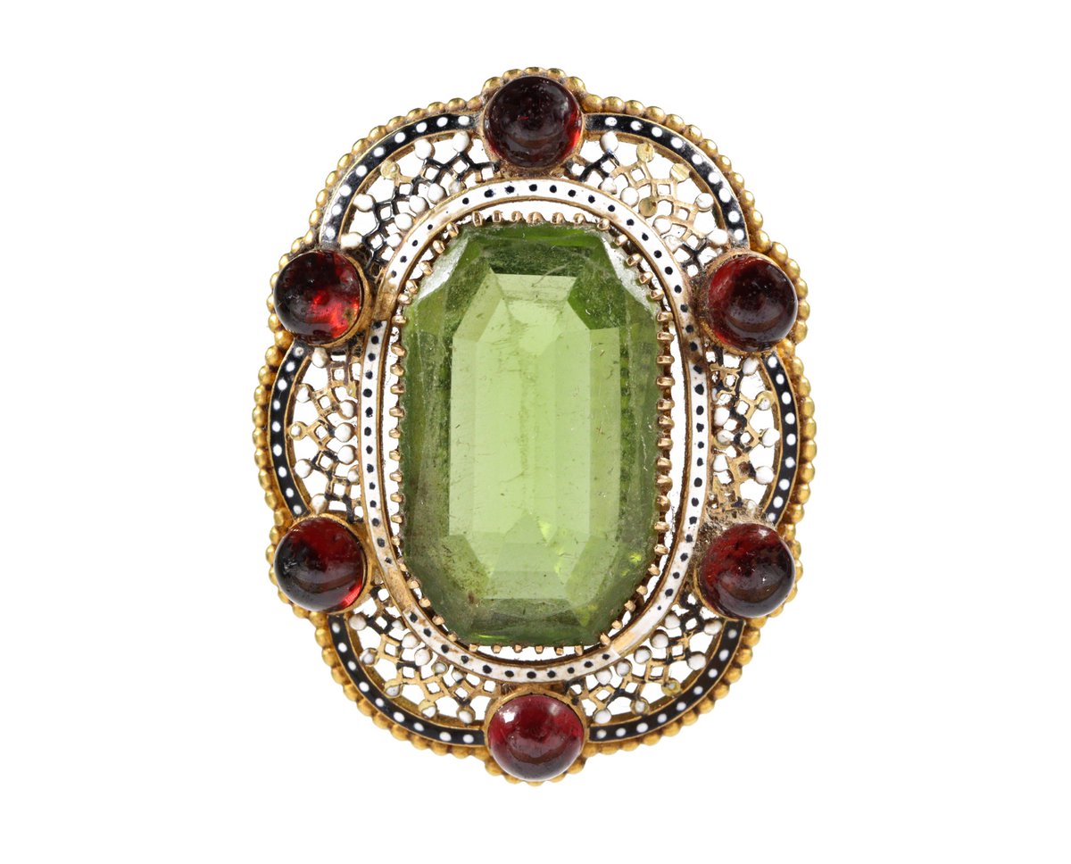SOLD for £1,100 in our last Sale: Lot 141 Victorian Gold and Enamel and Peridot Brooch. Now consigning for September auction. #victorian #gold #enamel #peridot #brooch #victorianbrooch #victorianjewellery