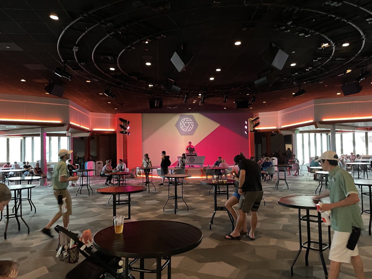 AliciaStella's tweet photo. Disney World’s hottest new club is ODYSSEY. This place has everything: a live DJ, big carpeted dance floor, overpriced chicken wings, and the crushed hearts of die-hard ‘EPCOT Center’ fans. https://t.co/NYLsiuzLRK