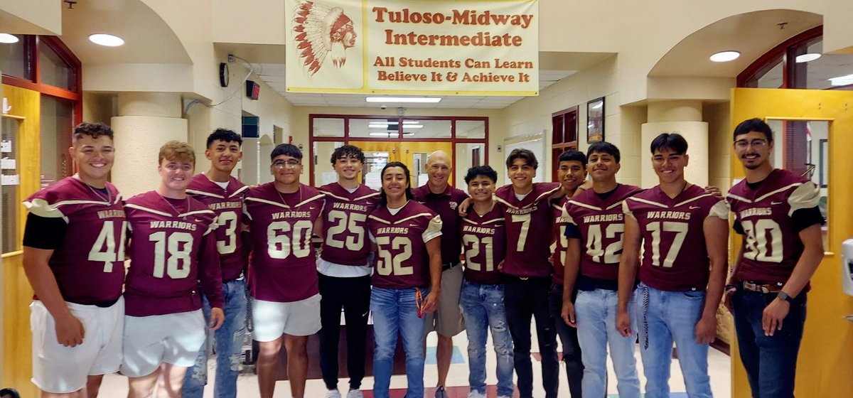 Love these Football players serving our students at the Intermediate School #TMNation