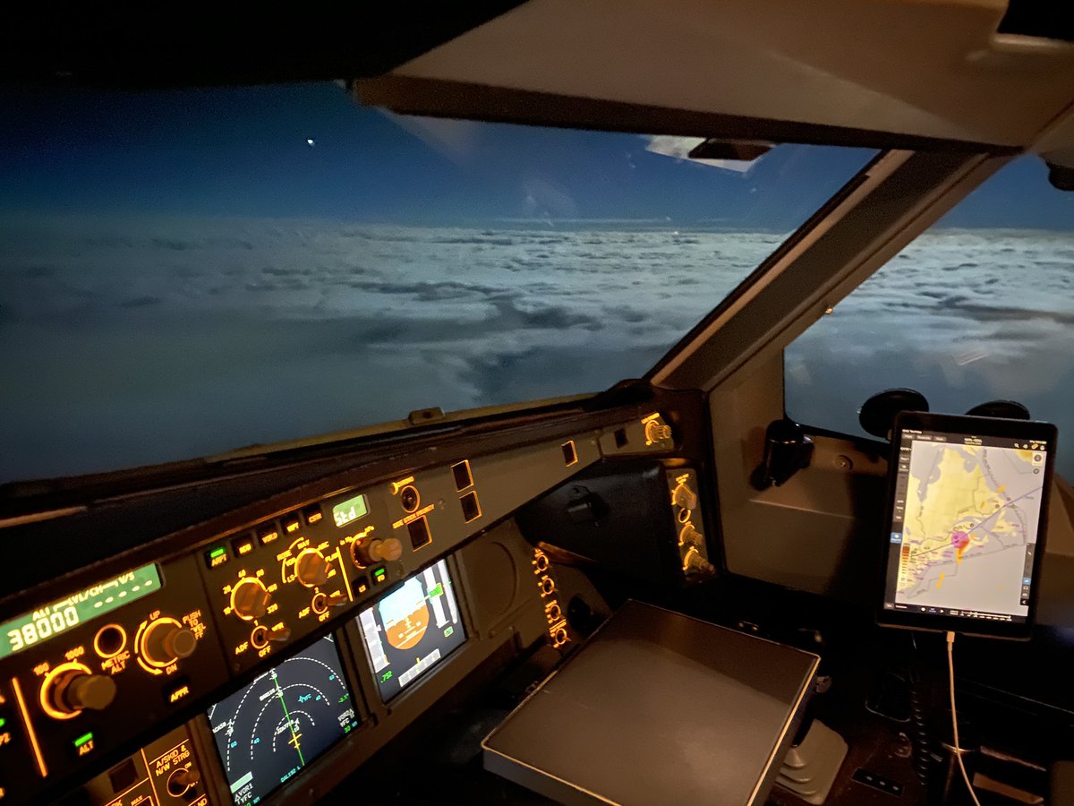 There was a very bright moon last night shining on the top of the cloud layer. It was almost like daylight during the night flight to London from Atlanta.