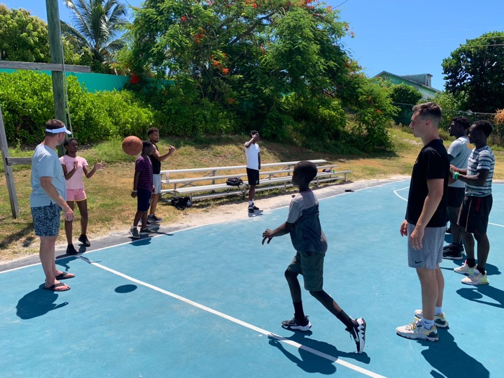 AppStateMBB's tweet photo. We provided a youth clinic on the beautiful Harbour Island. 

Once-in-a-lifetime opportunity to help grow the game of basketball globally 🏀🇧🇸 

#TakeTheStairs https://t.co/HFWZPWAHlU