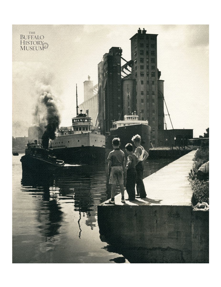 BuffaloHistory's tweet photo. Enjoy these lazy, hazy days of summer, Buffalo! Have a great weekend. This photo from our collection shows three boys looking out over the Buffalo harbor in the summer of 1939. #BuffaloHistory #ExperiencingHistoryWithYou https://t.co/kCBWFdX7dr