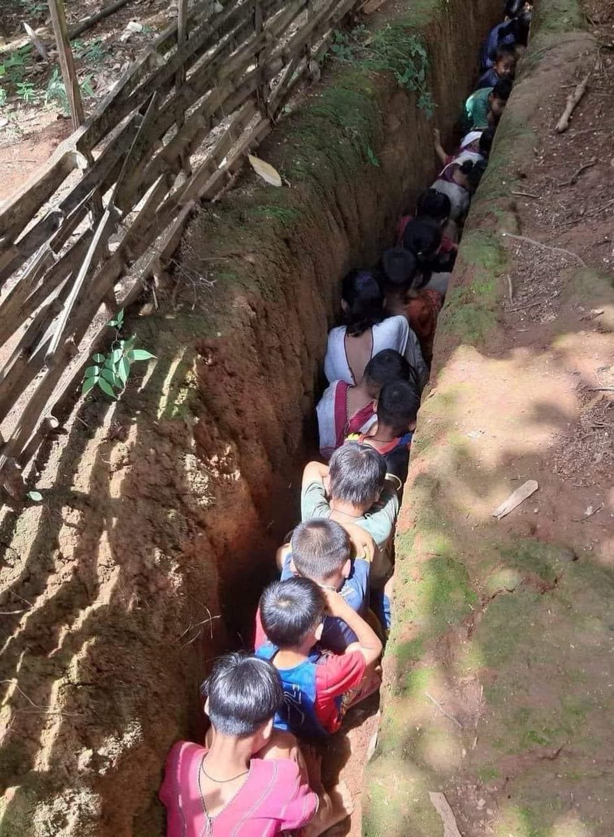 Children at School hiding in the pit due to the air strike by the Junta in Myanmar, Karen State, Kaw Thoolei.
#photo credit