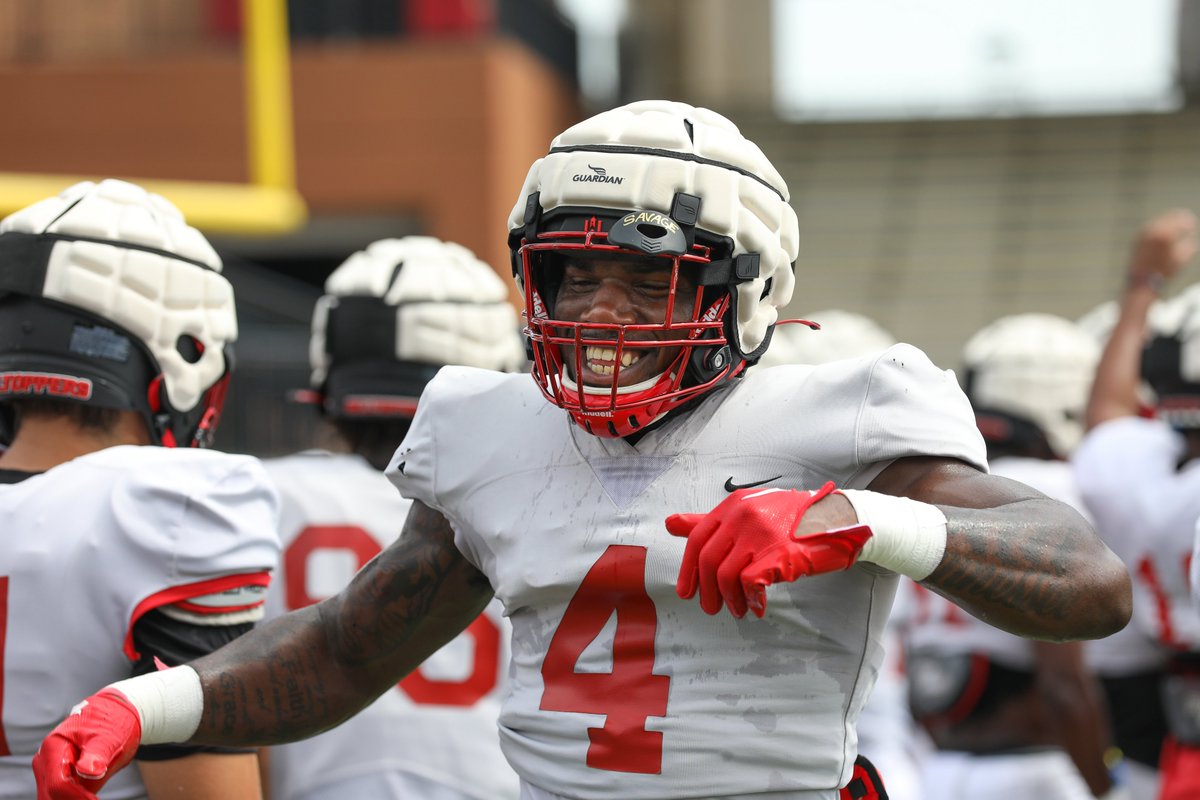 WKUFootball's tweet photo. When it's hot on the first day of full pads but you remember you can finally hit someone.

#GoTops | @nikocooper_9 https://t.co/68AAmfvS4p