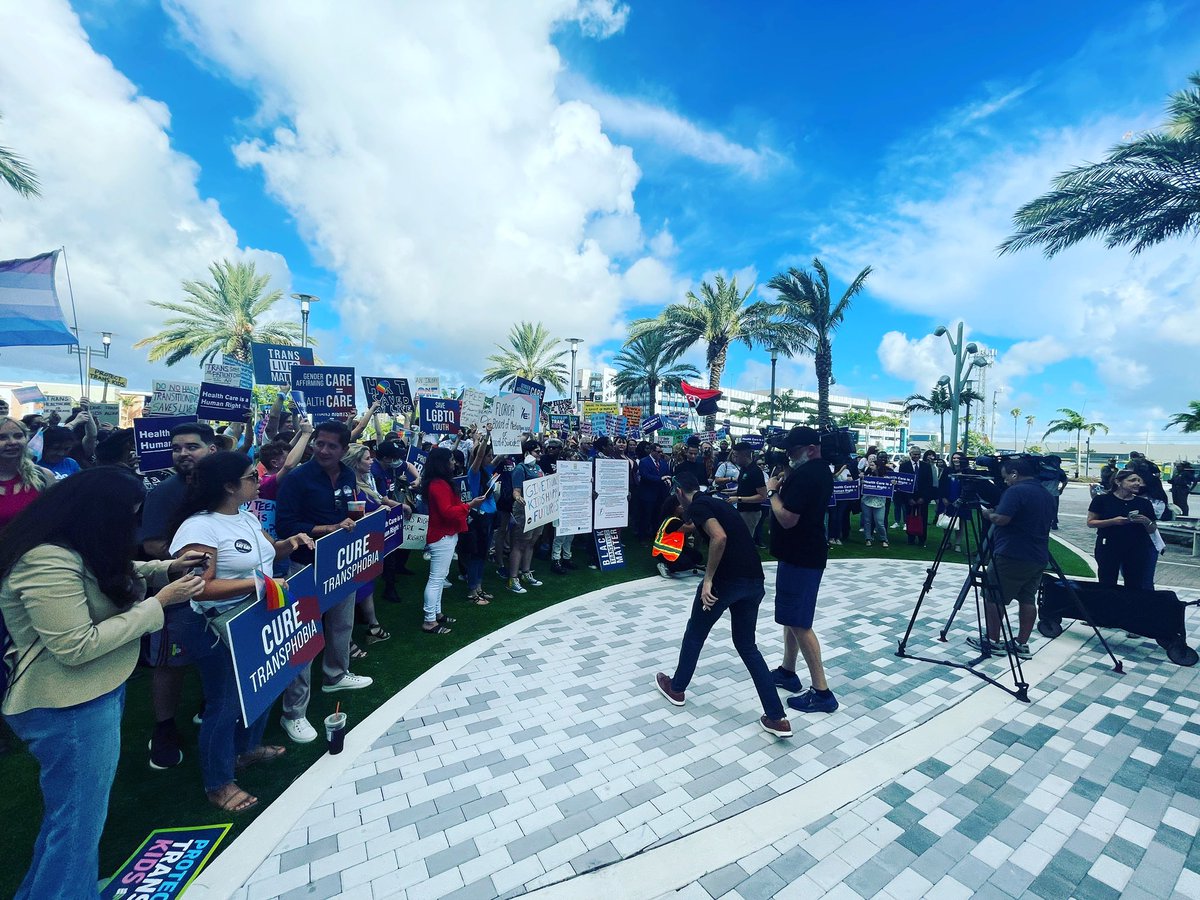 We left Orlando at 11pm so we could be in Dania Beach this morning to defend #TransLives as the DeSantis administration continues their transphobic agenda, this time trying to ban and restrict gender affirming care via the Board of Medicine. 1/2