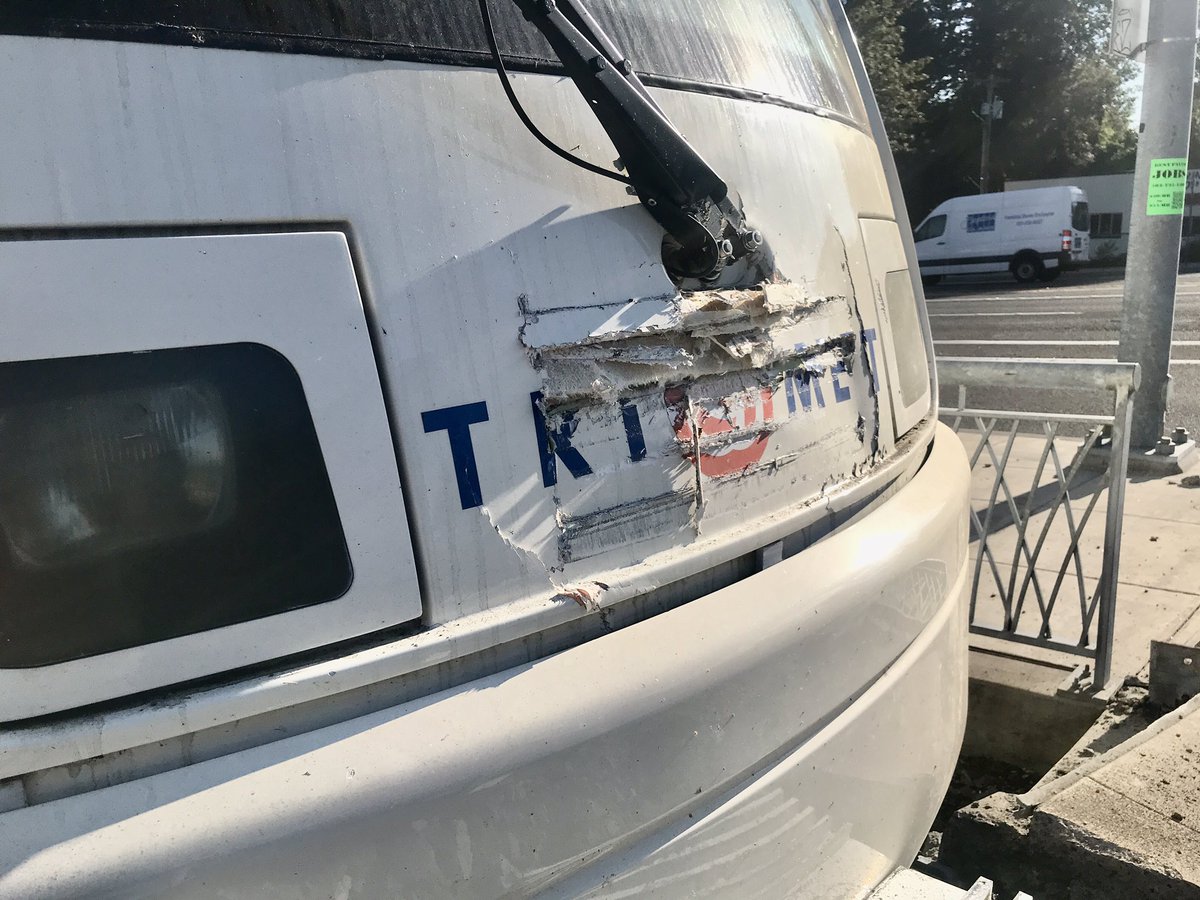 MikeKATU's tweet photo. HOLY MOLY… this @trimet MAX train DID NOT STOP at the end of the line in Milwaukie, smashing into the barrier!  Lots of damage to the sidewalk here.  Not sure how many passengers were on board, but at least one with minor injuries #LiveOnK2 #pdxtraffic https://t.co/9TWZFlZTFs