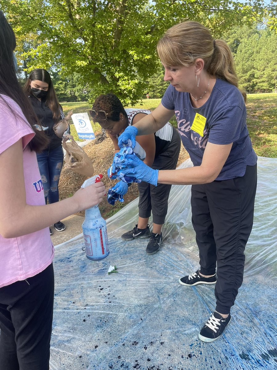 DrLoraleeHill's tweet photo. Who’s got tie dye? Every 8th Grade Griffin student!!! A fun team building &amp; school pride activity. Thanks to our teachers, PTSA, and lots of volunteers who assisted. ✅ out Mr. Holmes making a t-shirt!!! @GMS_Wildcats @ButlerNneka @LynzeeCourtney @CobbSchools #begreatbegriffin https://t.co/tR4OFzUigm