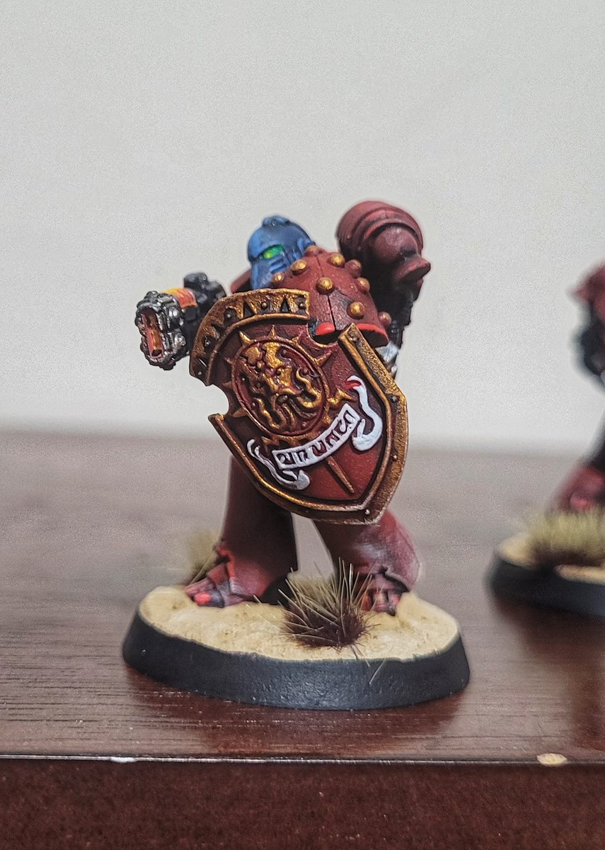 CastleRadgoski's tweet photo. My first test models for my horus heresy Blood Angels! I've splashed in blue to represent that this company still holds deep ties to the chapter's Neptune campaign early in the retaking of the sol system. 

@WarComTeam #horusheresy #warhammer40000 #miniaturepainting #miniatures https://t.co/pBY9kdkb49