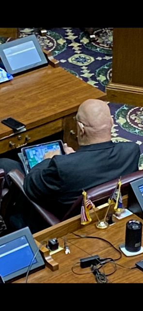 .<a href="/wrtv/">WRTV Indianapolis</a> photographer Paul Chiodo sent in this photo of Rep. Dr. Tim Brown, R-Crawfordsville, while <a href="/Maureen4Indiana/">Rep. Maureen Bauer</a> gives tearful testimony against Senate Bill 1, the bill dealing with abortion.