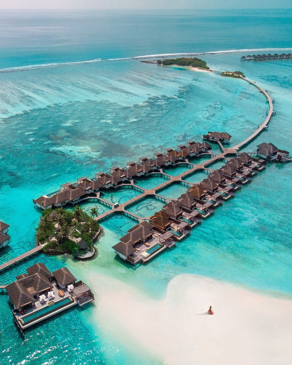 A colorful garden ‘village’ bathed by crystal waters just 25 minutes from the airport.
.
.
DM/ Email/ WhatsApp for best rates!
.
.
📸: <a href="/fsmaldives/">Four Seasons Resorts Maldives</a> 
.
.
.
#aerialphotography #maldivesislands #ansamatravel #garden #watervilla #bucketlisttravel #northmaleatoll #turquoisewater