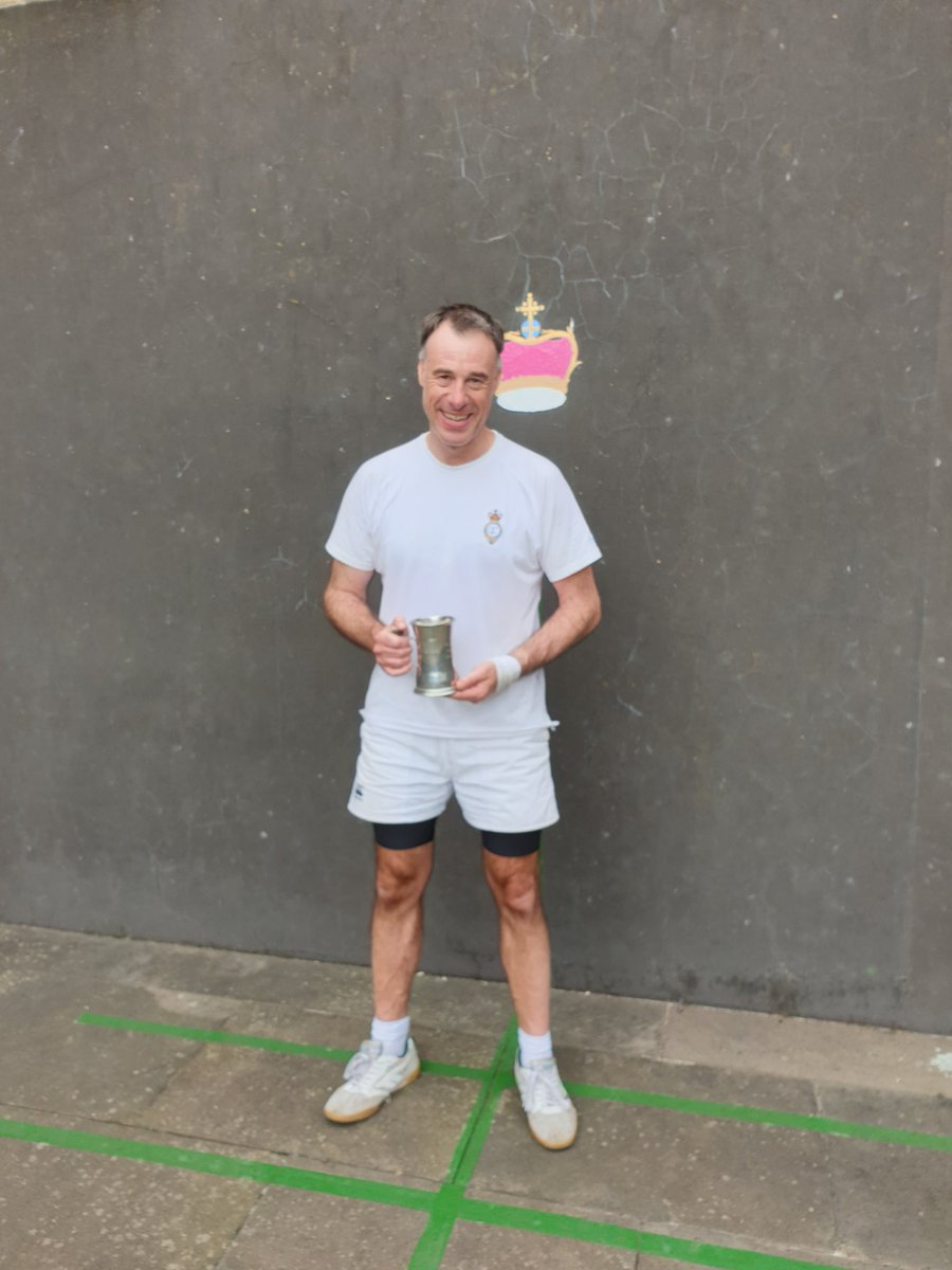 Ewan wins the club singles championship against Peter 3 - 0