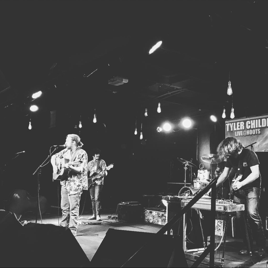 _NewSlang's tweet photo. Five years ago today, @charliestout and I drove up to Amarillo to see an up and coming Kentuckian named @TTChilders play a show on the night he released a little record called Purgatory. He literally played an acoustic rooftop library show in Abilene the night before. https://t.co/XtCJKXfUNf
