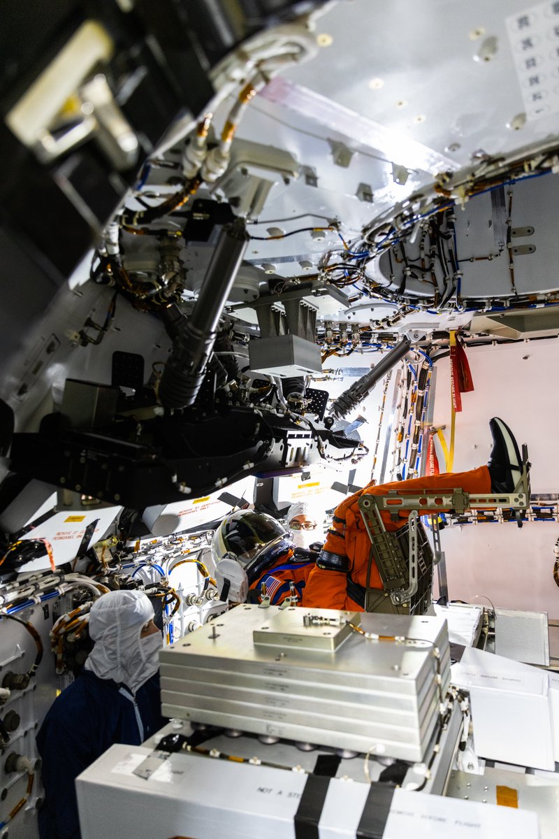 NASAGroundSys's tweet photo. Moonikin “Campos” secured in a seat inside the Artemis I @NASA_Orion crew module atop the @NASA_SLS  rocket in High Bay 3 of the Vehicle Assembly Building at @NASAKennedy. Artemis I is scheduled to launch no earlier than Aug. 29th, with backup dates of Sept. 2nd and 5th. 🚀🌕 https://t.co/JT6CC83ioX