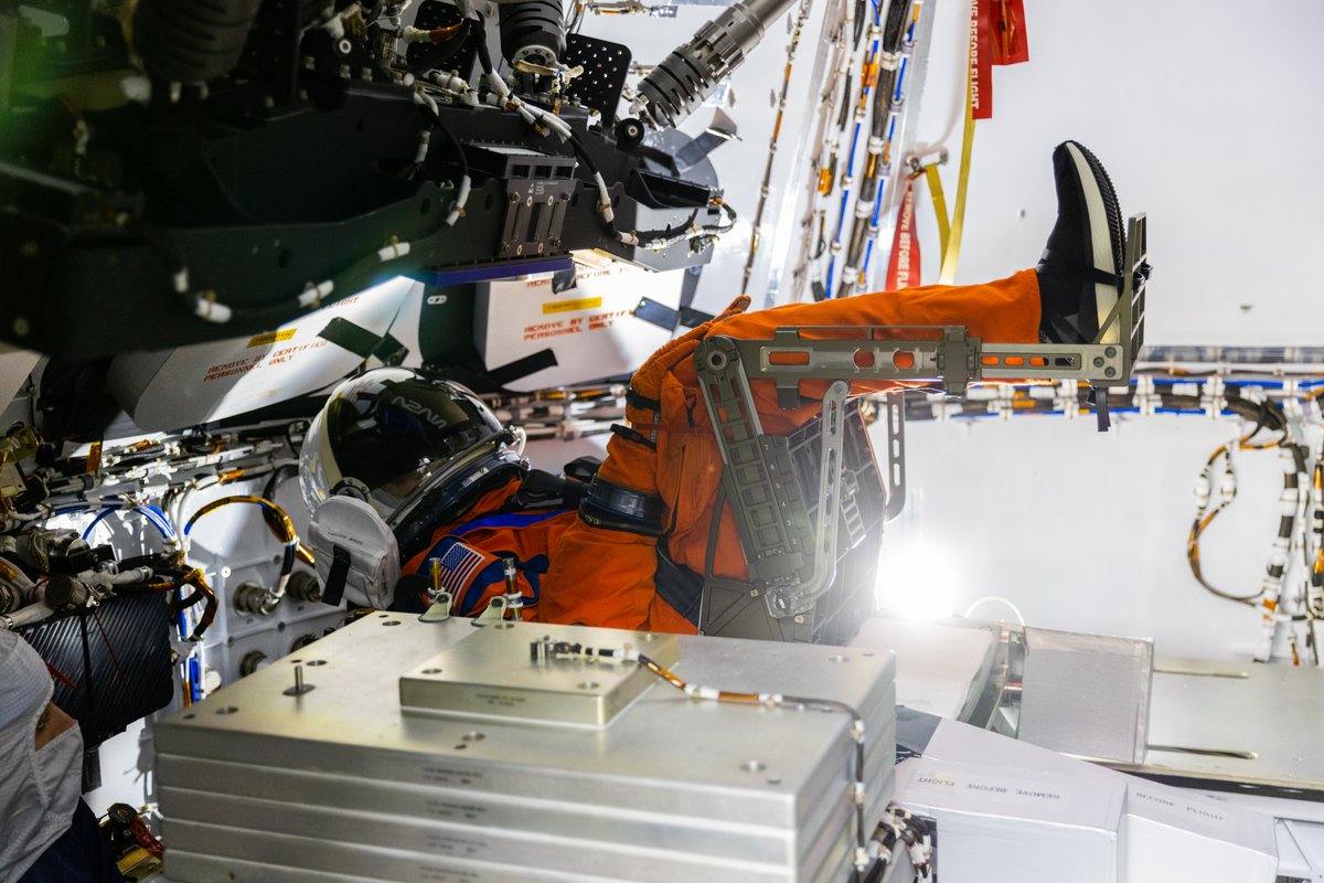 NASAGroundSys's tweet photo. Moonikin “Campos” secured in a seat inside the Artemis I @NASA_Orion crew module atop the @NASA_SLS  rocket in High Bay 3 of the Vehicle Assembly Building at @NASAKennedy. Artemis I is scheduled to launch no earlier than Aug. 29th, with backup dates of Sept. 2nd and 5th. 🚀🌕 https://t.co/JT6CC83ioX