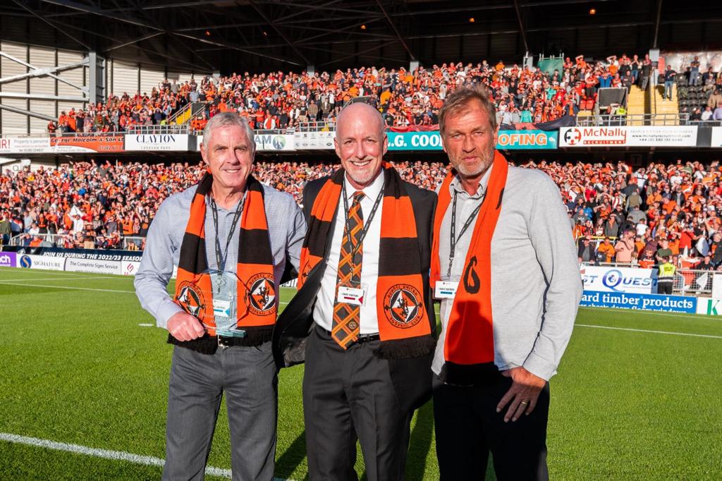 NVU_soccer's tweet photo. @dundeeunitedfc fans welcomed Hall of Fame player and @nvufc Executive Director Brian Welsh! Joined by #Markogren #davidnarey #unitedtogether https://t.co/8fMKK4pgRX