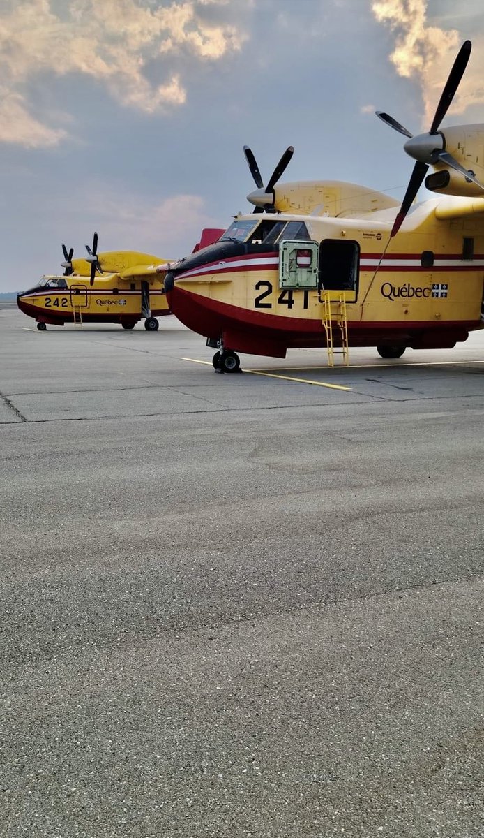 townofgander's tweet photo. Two water bombers arrived in Gander, from Quebec, today to assist with the active wildfires in the province. 

Thank you Quebec for your support❤️ and thank you to all those working tirelessly to control the fires and protect our communities. https://t.co/d3OK52MGcQ