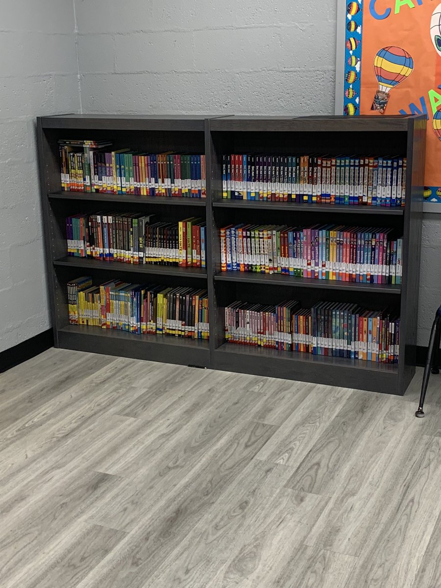 DBemkeWWMS's tweet photo. Worked hard this past week getting @16Clifton ready to open for students in a few weeks. The shelves are full just waiting for the students to check out all the new books !!📚📚@CliftonSchools @VKropinack @CliftonSupt https://t.co/Q0nuTiJ5gz